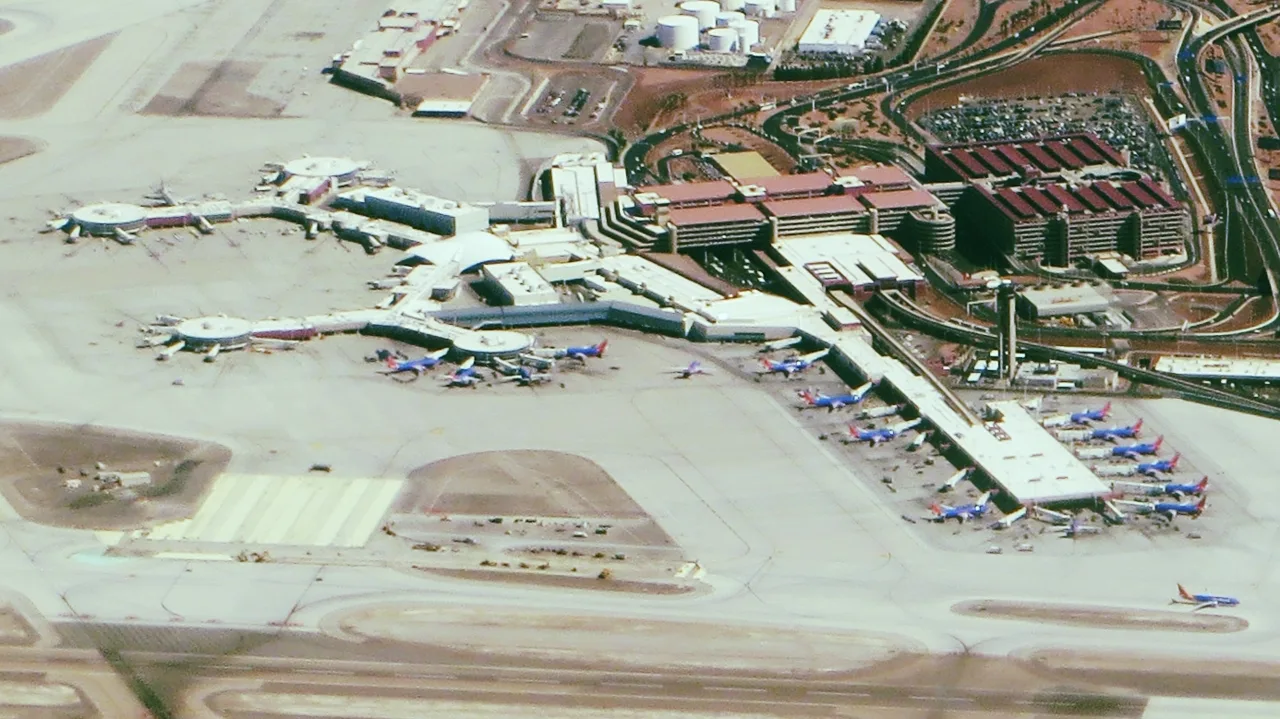 Harry Reid International Airport terminal with commercial airplanes on the tarmac in Las Vegas