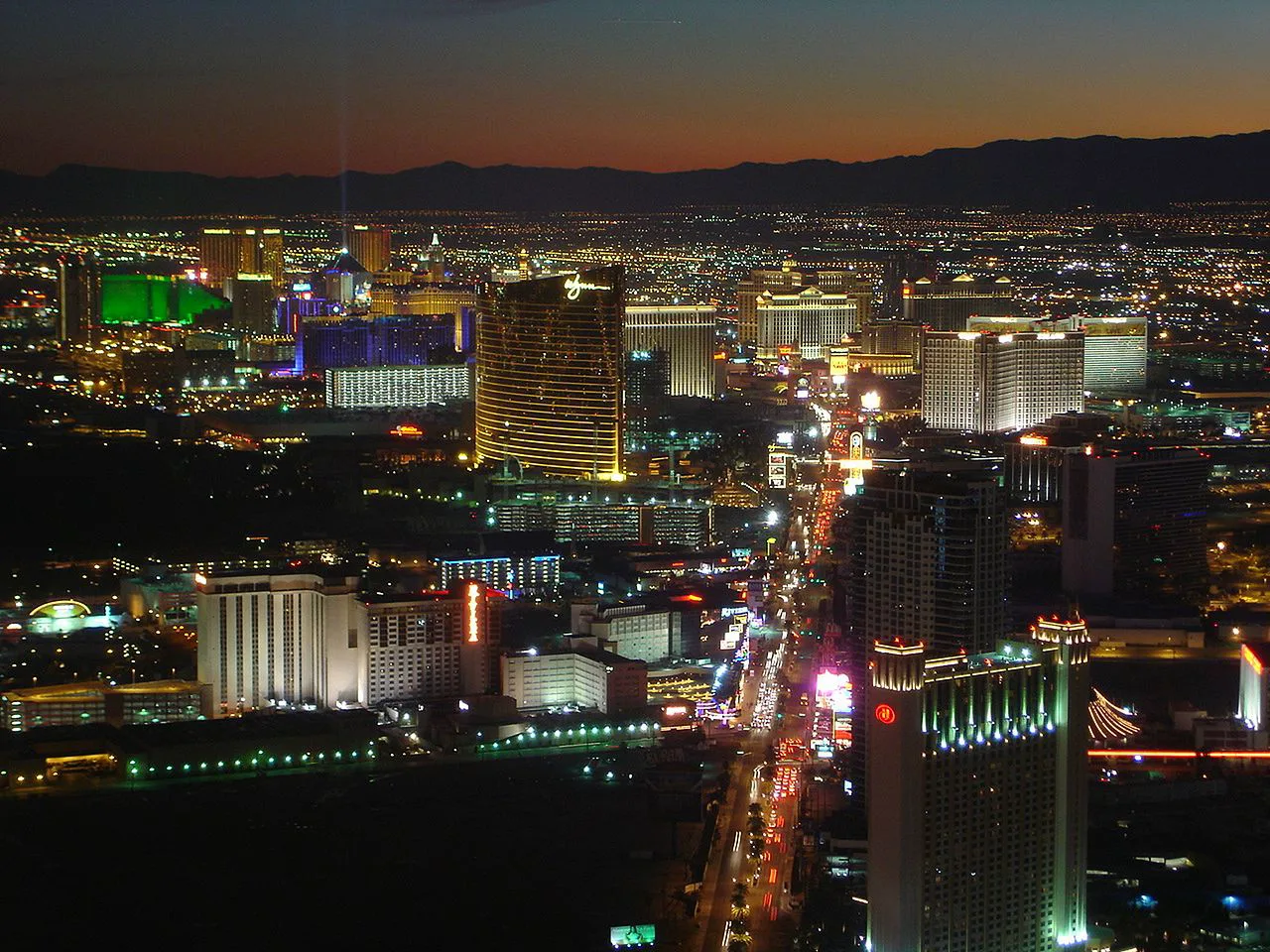 Las Vegas Strip skyline at sunset with the surrounding valley and suburbs