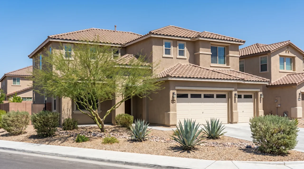 New construction home in Las Vegas with desert landscaping under a clear blue sky