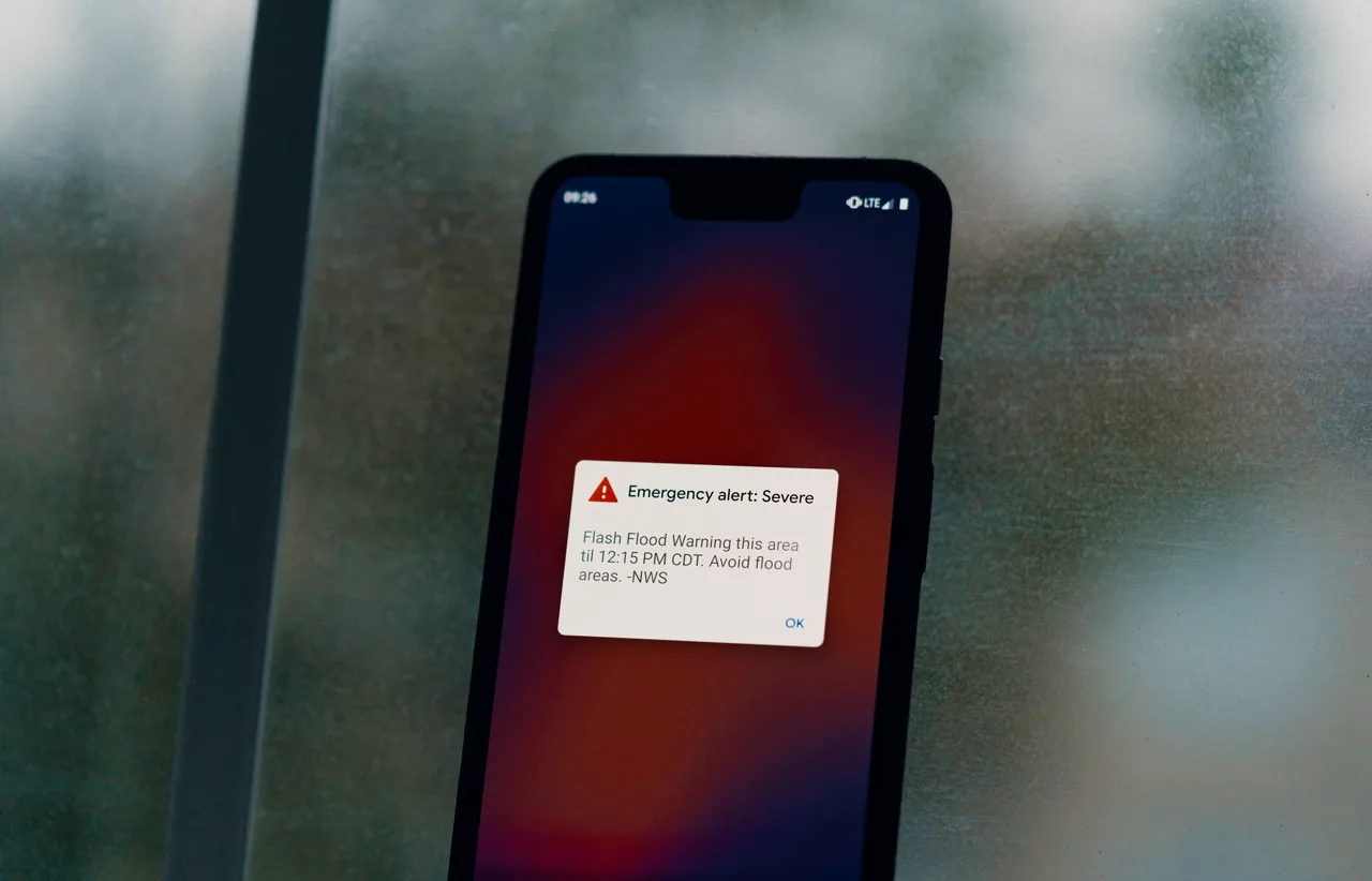 Smartphone screen displaying an emergency weather alert notification